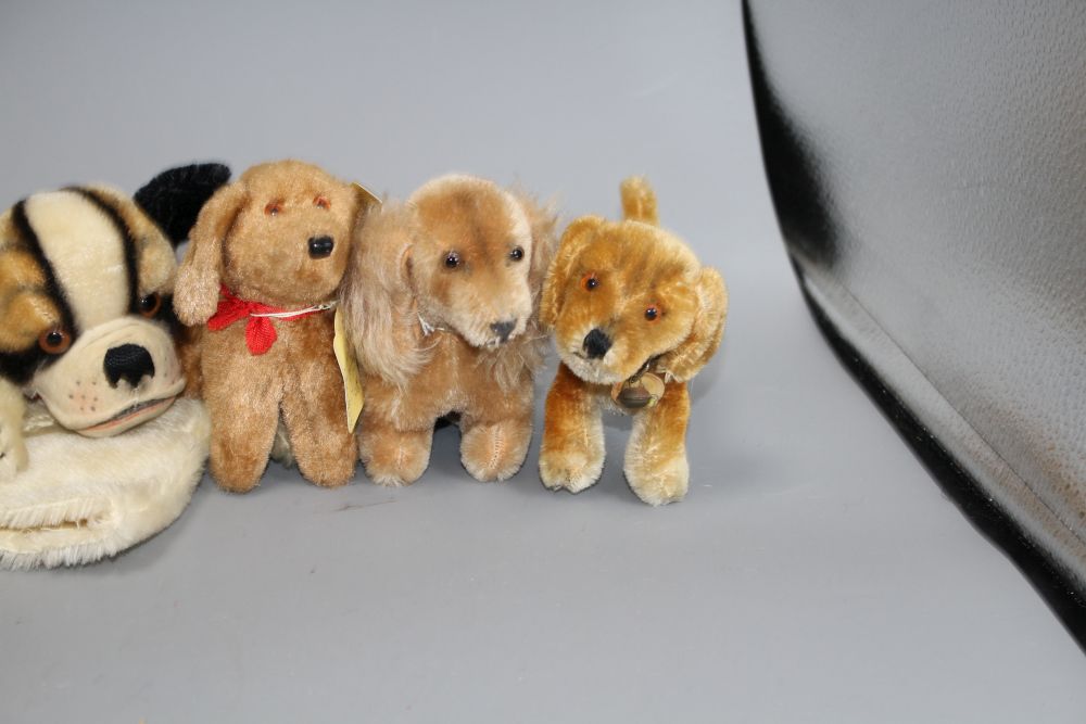 Eight assorted vintage soft toy dogs including Steiff